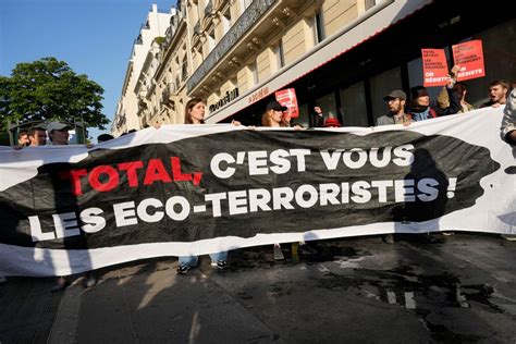 Climate protesters face tear gas at oil major TotalEnergies shareholder meeting in Paris
